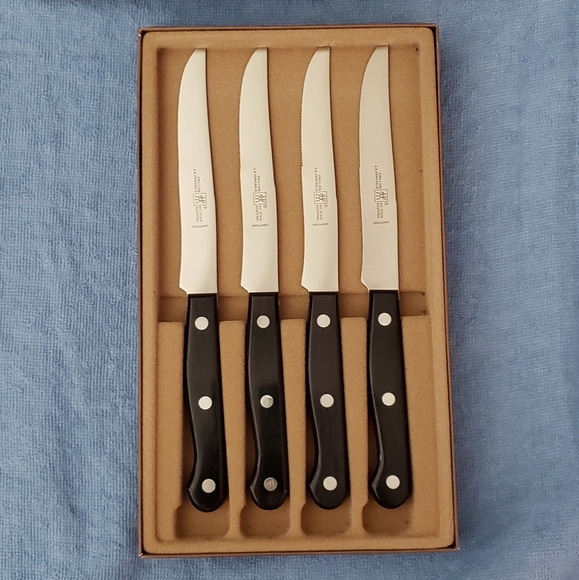 Brand new set of four Zwilling J A Henckels knives.